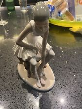 Lladro NAO Figurine Elegant Ballet Ballerina Seated Putting On Slippers picture