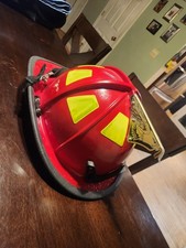 MSA Cairns Fire Helmet 1044 Red w/flaps and fold down visor picture
