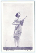 c1940's A Woman Volunteering Holding Long Gun Japan Military Vintage Postcard picture