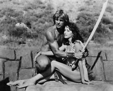 The Beastmaster Marc Singer holds sword & arms around Tanya Roberts 24x36 Poster picture