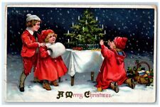 1911 Merry Christmas Children Decorating Christmas Tree Handwarmer Postcard picture