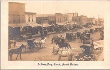 RPPC Clark South Dakota Busy Street Scene Wagons Carriages early 1900s picture