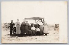 RPPC Group of People in Front of Car c1920  Real Photo Postcard picture