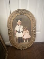 Antique Photo In Ornate Wooden Frame  picture