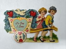 Vintage Valentine Mechanical Wheel BoyGirl Pulling Car Filled with Flowers Dove picture