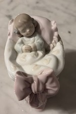 Lladro A New Treasure Baby Girl in Bassinet Figurine 6977 picture