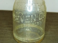 VINTAGE 1 QT MILK BOTTLE SEVEN OAKS DAIRY STORE BOTTLE picture