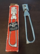 The vintage Crest combination tool, likely dating back to the 1950s or 1960s. picture